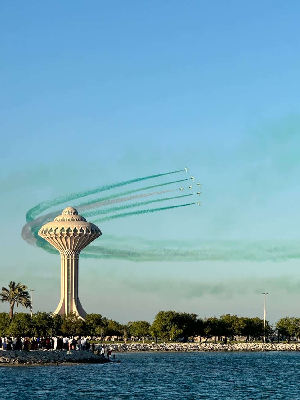 al khobar airshow with water tower and jets