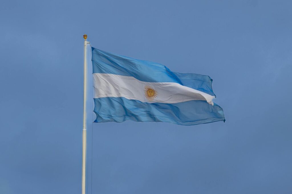 argentinian flag waving against clear sky